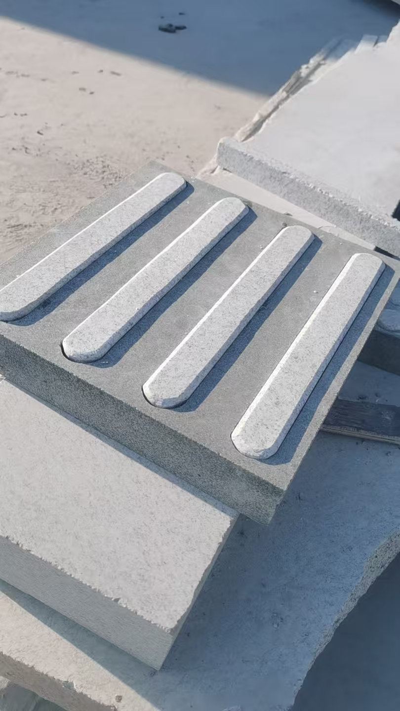 Directional stone tactile indicators